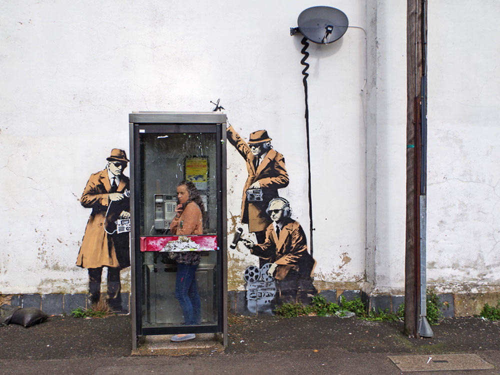 cover with spy booth from banksy